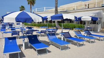 Private beach, white sand, sun-loungers, beach umbrellas