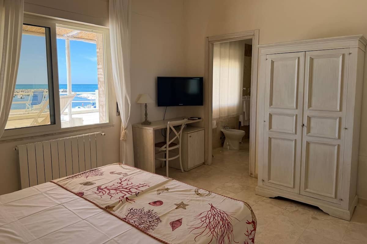 Superior Double Room, Sea View | Minibar, in-room safe, blackout drapes, free WiFi