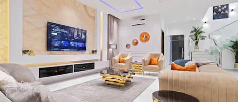 Appartement Économique, balcon, vue ville | Coin séjour