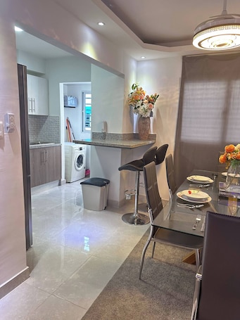 Apartment, 2 Bedrooms, Balcony, City View | Dining. Cozy Santo Domingo Apartment in San Isidro