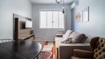 Basic Apartment | Living area | 32-inch Smart TV with digital channels