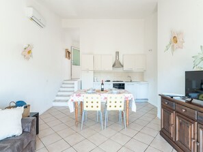 Apartment, 2 Bedrooms | Dining room - Complex Surrounded by Greenery With Pool (Arzachena)