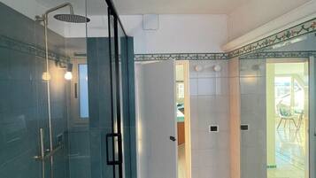 Shower, bidet, towels, soap