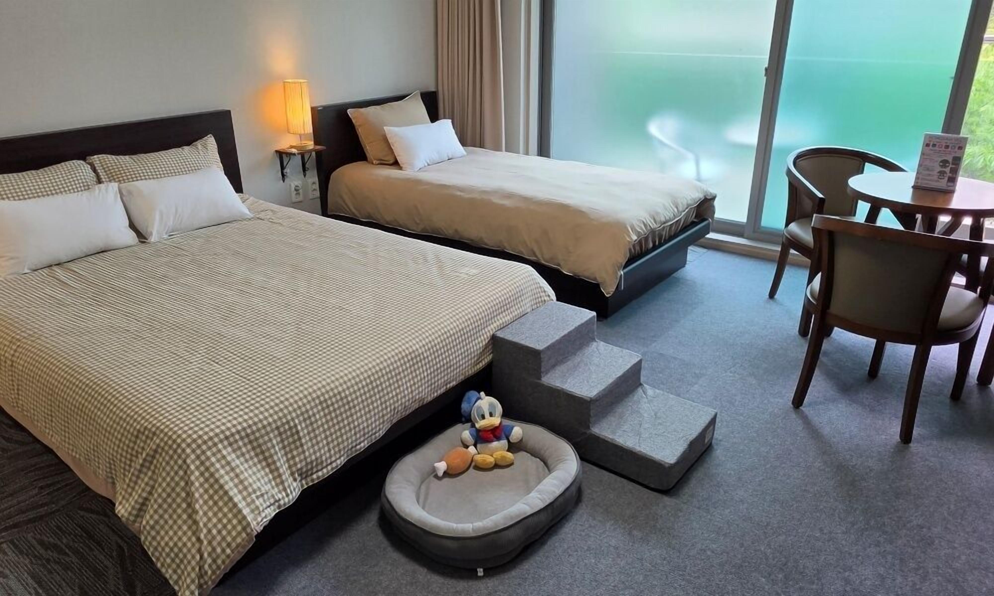 Dog Friendly Deluxe Twin | Individually decorated, individually furnished, free WiFi
