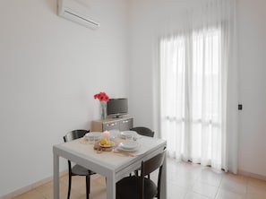 Apartment, 1 Bedroom, Terrace | Dining room - Elegant House in Villasimius (Villasimius)