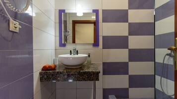 Shower, free toiletries, hair dryer, towels