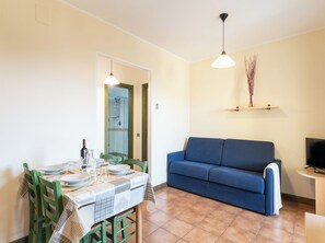 Apartment, 1 Bedroom, Balcony, Pool View | Living room - Charming House Near Rena Bianca Beach (Santa Teresa di Gallura)
