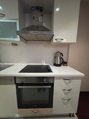 Dúplex Deluxe, vista a la ciudad | Cocina privada