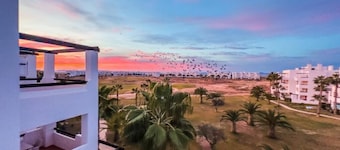 Sun-facing penthouse with pool and stunning golf course views