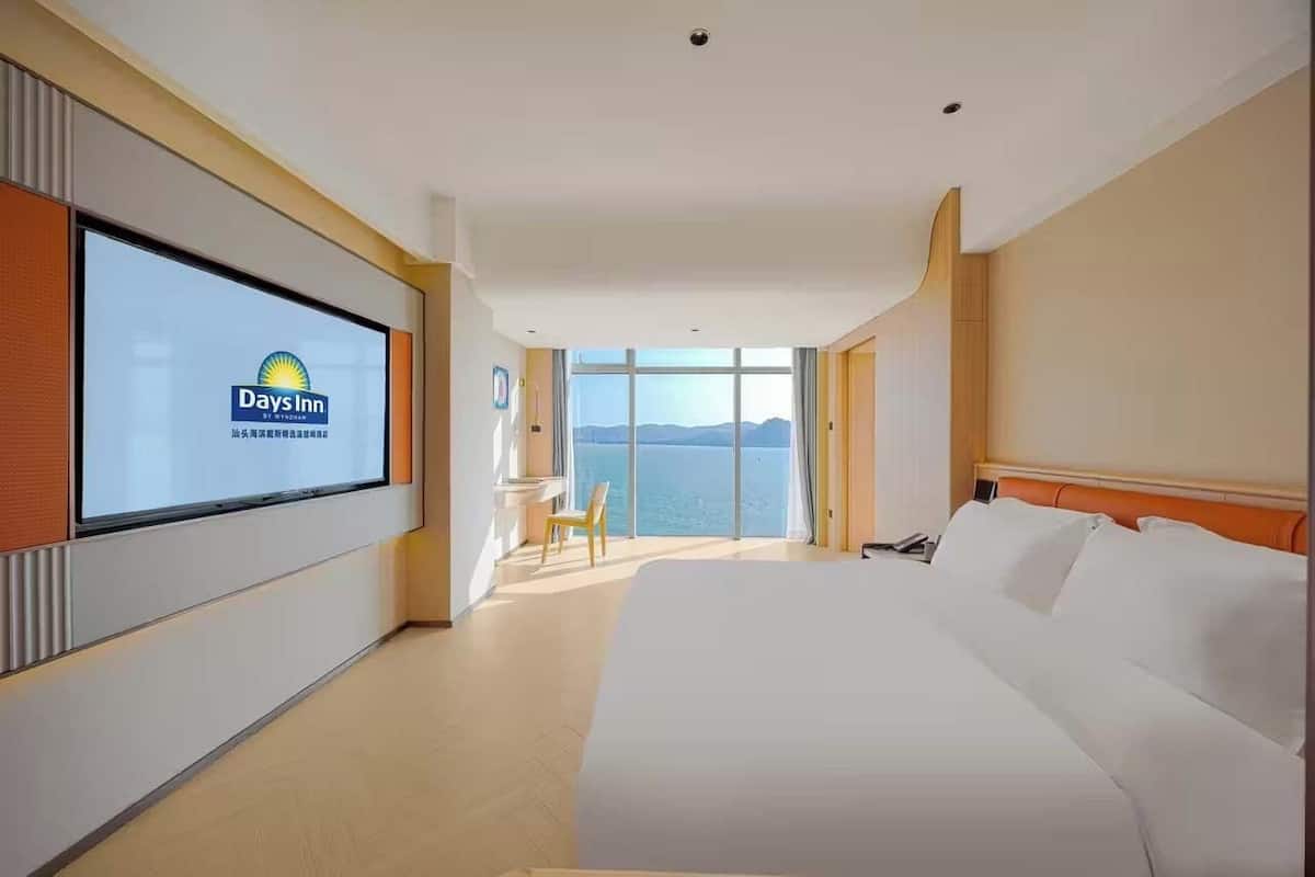 Suíte superluxo, vista para o oceano | Escrivaninha, espaço de trabalho para notebook, Wi-Fi de cortesia