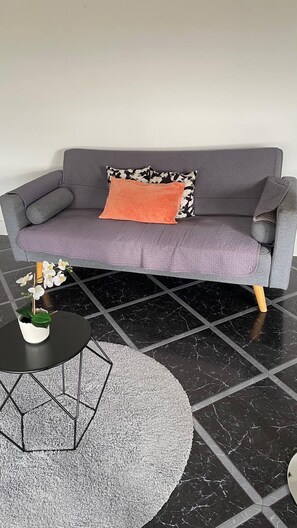 Apartamento, 3 quartos | Área de estar