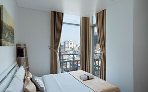 Suite familiar, 3 habitaciones, con acceso al salón lounge del club, vista a la ciudad | Vista desde la habitación