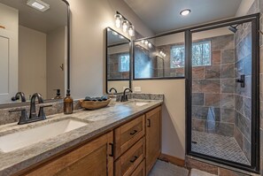 Shower, hair dryer, towels, toilet paper