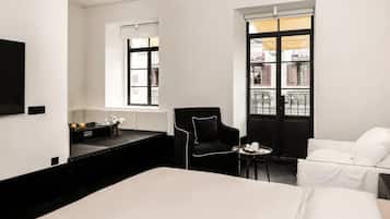 Suite Elite | Ropa de cama de alta calidad, minibar, decoración individual