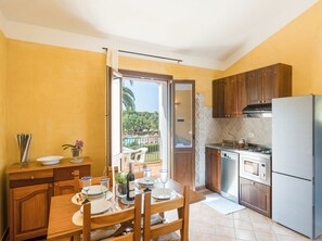 Apartment, 1 Bedroom, Balcony, Garden View | Dining room - Holiday Home in a Private Residence (Pula)