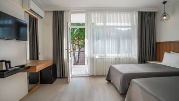 Dobbelt- eller tomannsrom – deluxe | Wi-fi (inkludert) og sengetøy