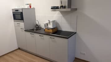 Comfort Apartment, Garden View | Private kitchen | Mini-fridge, dishwasher