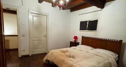 Room with private bath and gym near Bassano, parking included