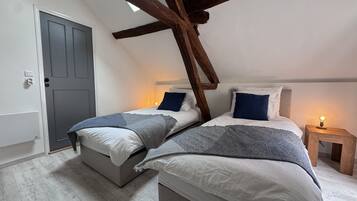 2 slaapkamers, een strijkplank/strijkijzer, gratis wifi, beddengoed
