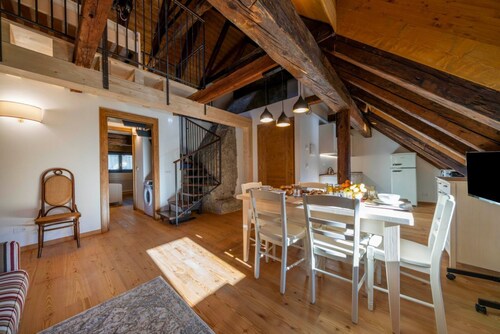A comfortable 94 square meters apartment, perfect for seven people, located on the second floor of a historic building dating back to 1864 and renovated in 2025 while maintaining its historic atmosphere (NO elevator).The property is located on Tarvisio's