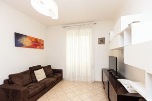 Apartamento | Área de estar | TV 40 polegadas com canais digitais