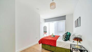 2 bedrooms, desk, iron/ironing board, travel crib