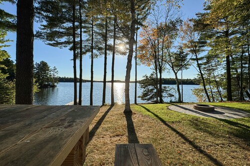 Waterfront home in great location with private dock, firepit &  deck