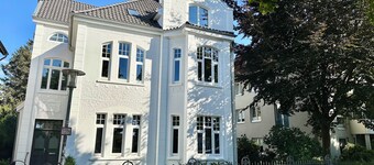 Shore residence: old building jewel on the coastal canal with terrace & garden