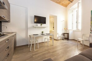 Apartment | Living area | Flat-screen TV - Rental in Rome Sant'angelo Apartment (Rome)