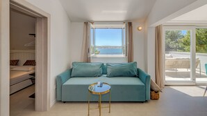 Penthouse Cao cấp, quang cảnh biển | Khu phòng khách | Smart TV 100-cm có truyền hình kỹ thuật số 