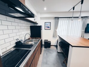 Family Apartment, Balcony | Private kitchen | Fridge, cookware/dishes/utensils - Plan A Tennozu Isle (Tokyo)