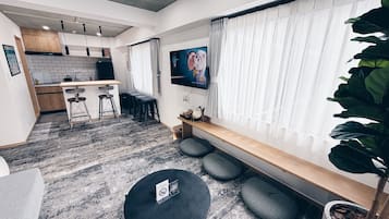 Family Apartment, Balcony | Down duvets, in-room safe, desk, laptop workspace