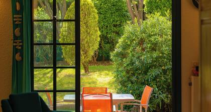 TrĂšs bel app 150m de la plage 50m de la piscine