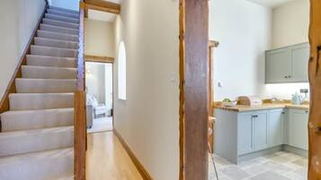 Superior House, Garden View | Living area | TV