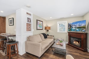 House, Multiple Beds, Patio, Garden View (855 N Grant Ave) | Living area | Fireplace - Kanons Kottage Downtown Retreat Near Rmnp (Loveland)