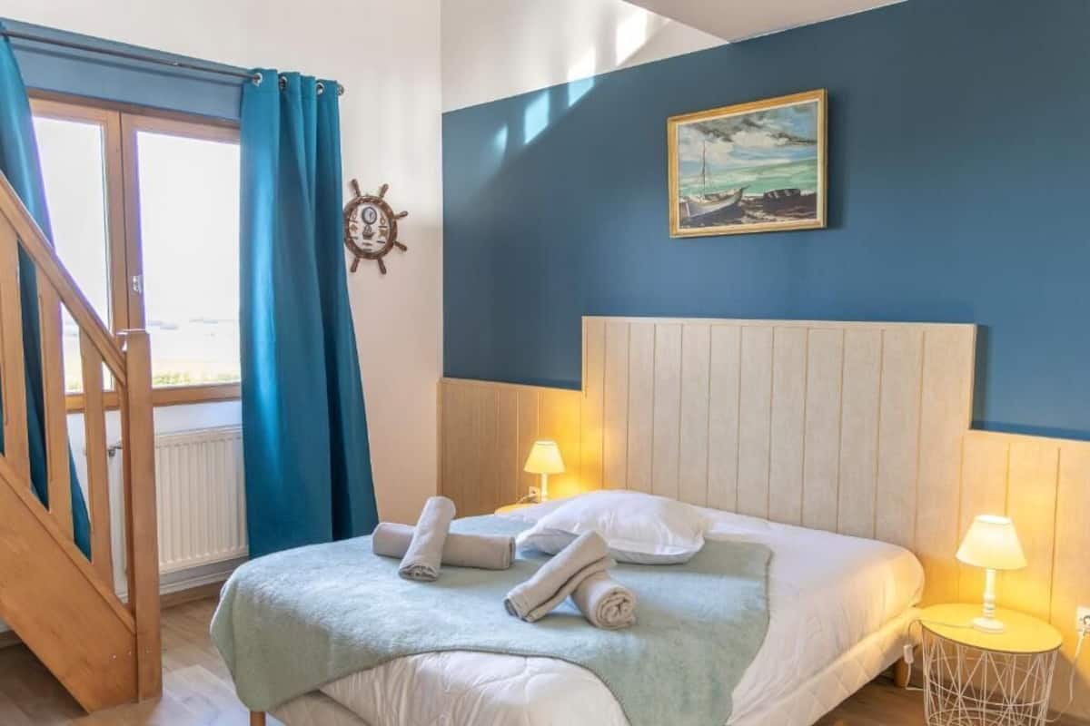 Habitación familiar, vistas al jardín | Cortinas opacas y wifi gratis