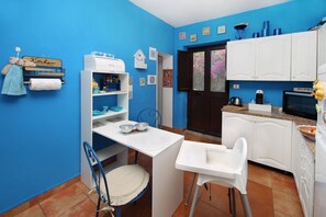 Private kitchen - L’Oasi nella Natura is an independent house with large private outdoor spaces and a 180-degree panoramic view of the Mediterranean Sea and the Aeolian Islands.The house consists of two air-conditioned double bedrooms, a living and dining area, a fully  (Caronia)