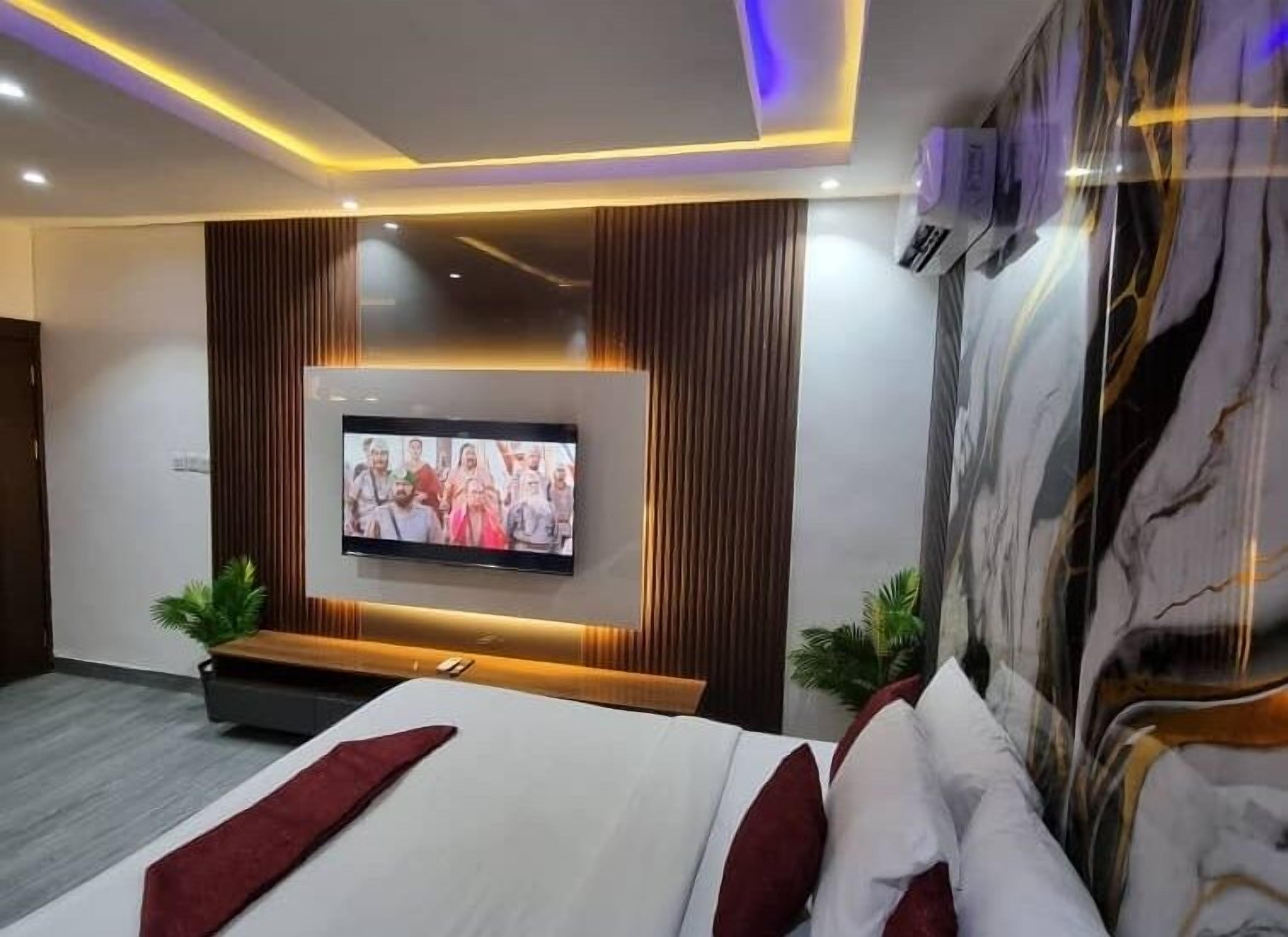 Deluxe Room, Balcony, City View | Desk, laptop workspace, blackout curtains, soundproofing