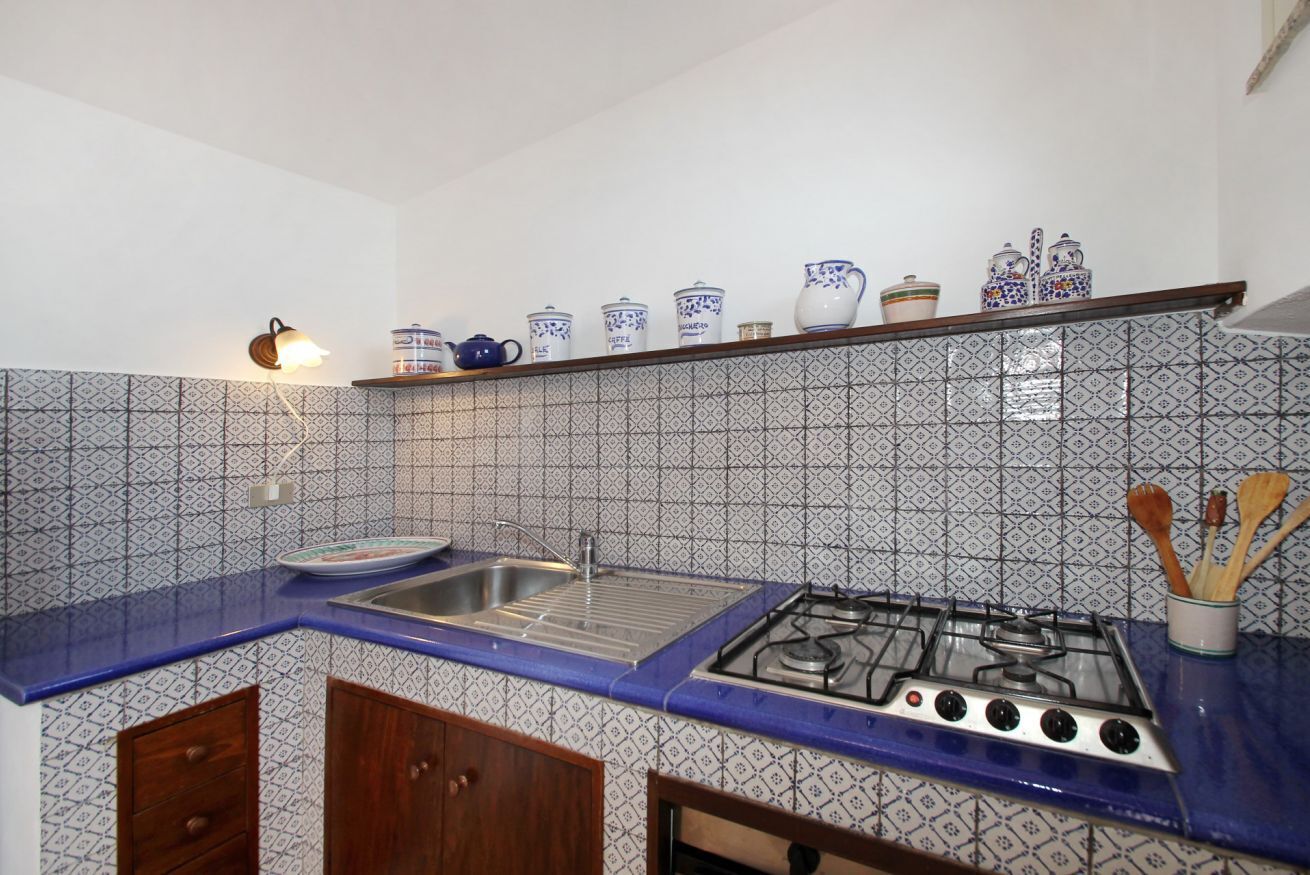 Frigorífic, forn, placa de cuina i trona 