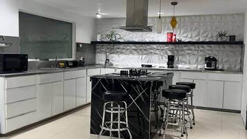 Fridge, microwave, stovetop, cookware/dishes/utensils