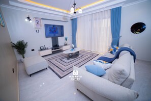 Appartement, 1 chambre | Coin séjour