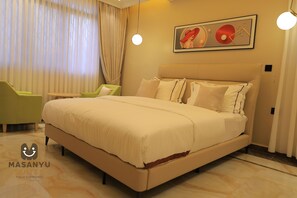 Studio | Individually decorated, individually furnished, desk, laptop workspace - Masanyu Suites (Kampala)