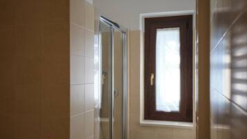 Luxury Triple Room, Pool View | Bathroom | Hair dryer, bidet, towels