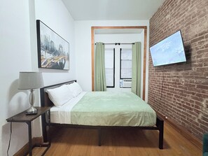 1 dormitorio, tabla de planchar con plancha, cuna de viaje y wifi gratis