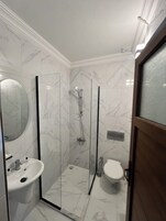Standard Room, Balcony | Bathroom | Shower, hair dryer, slippers, towels