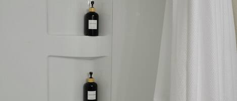 Hair dryer, towels, soap, shampoo