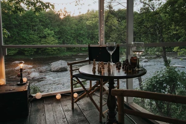 Incredible screened in porch over the river