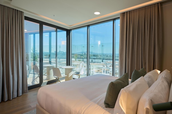 Suite, 1 King Bed, Terrace, City View (Living Room;with Sofabed) | Minibar, in-room safe, desk, laptop workspace