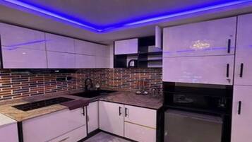 Fridge, microwave, stovetop, electric kettle