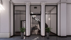 A modern hotel entrance with a staircase leading to the lobby, featuring a sign for 'Sophia Palace Hotel Budapest'. - SOPHIA PALACE Hotel Budapest (Budapest)